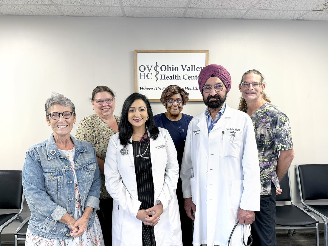 Daughter joins father at health center